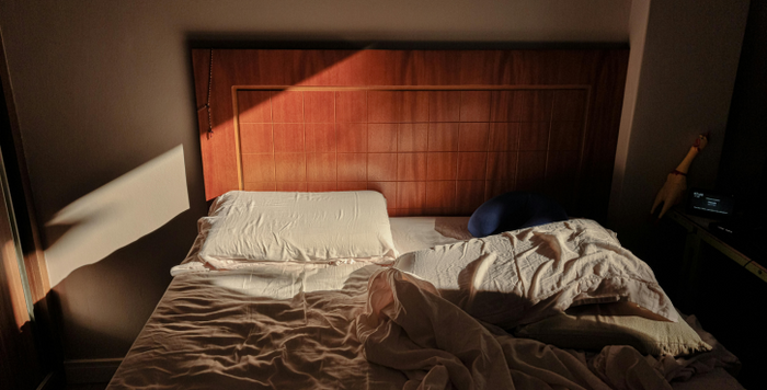 Image of bed in sunlight