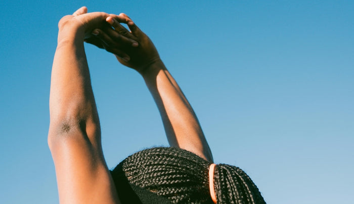 Woman stretching outdoors