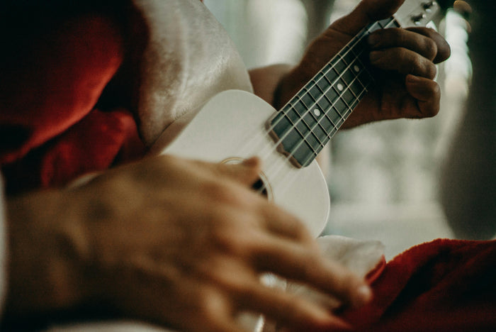 Person playing guitar